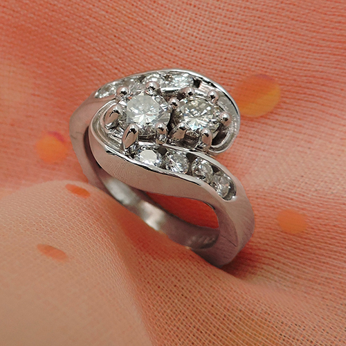 Diamond Silver with a Peach Background Ring Made Through Custom Jewelry Design and Jewelry Repair in Colorado Springs